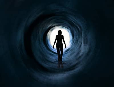 Photo of a women alone in a tunnel